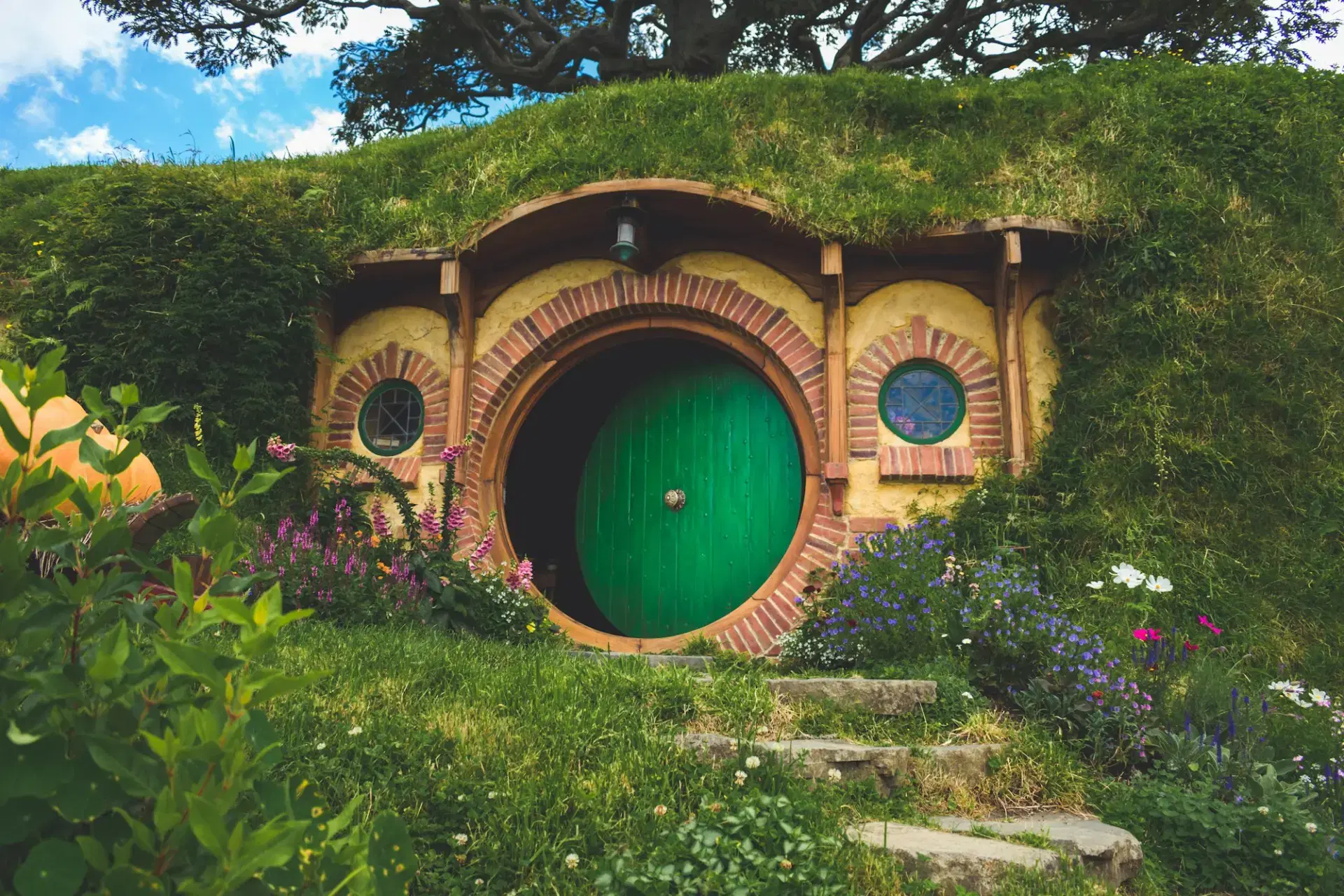 Leafy path through the gardens of the Hobbiton Movie Set